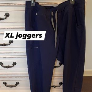 Navy blue figs joggers. Lightly used. Size XL
